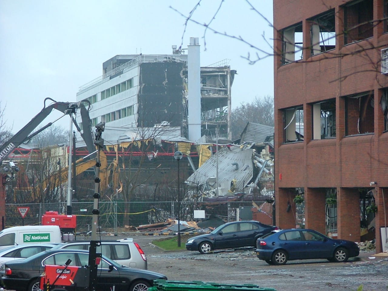 the buncefield depot is behind the northgate building (at the right of this photo). the building lost the glass from all of its window