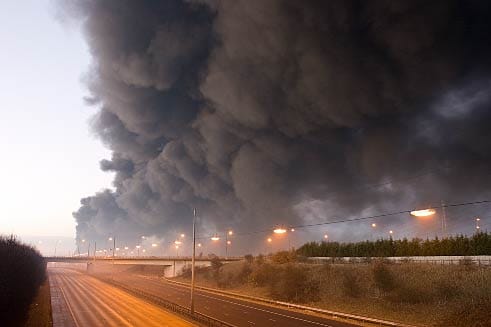 smoke from the blast, visible from hemel hempstead, above the closed m1 motorway on the day of the explosion